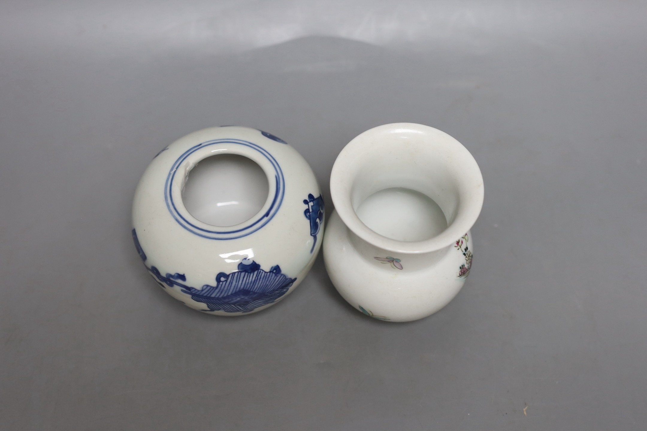 A Chinese famille rose vase, 10cm, together with a Chinese blue and white water pot, 9cm high
